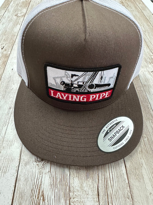 Laying Pipe - Brown/White